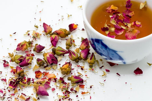flower petals and cup of tea